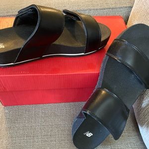 New in box, never worn. Black New Balance women’s City Slide Sandals, size 8